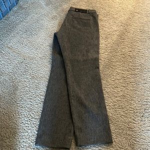 Grey slacks . NWT  . Ankle length, skinny fit they hip and thigh.